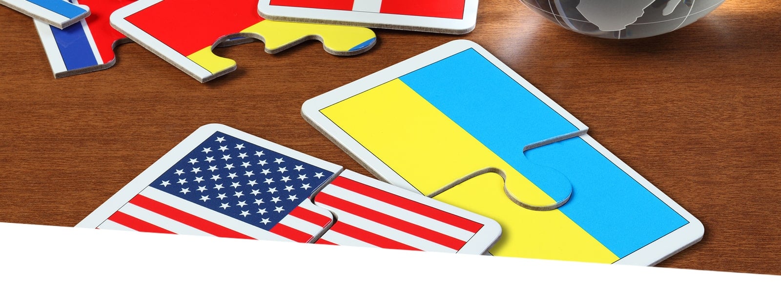 Puzzles of Ukraine and USA flags